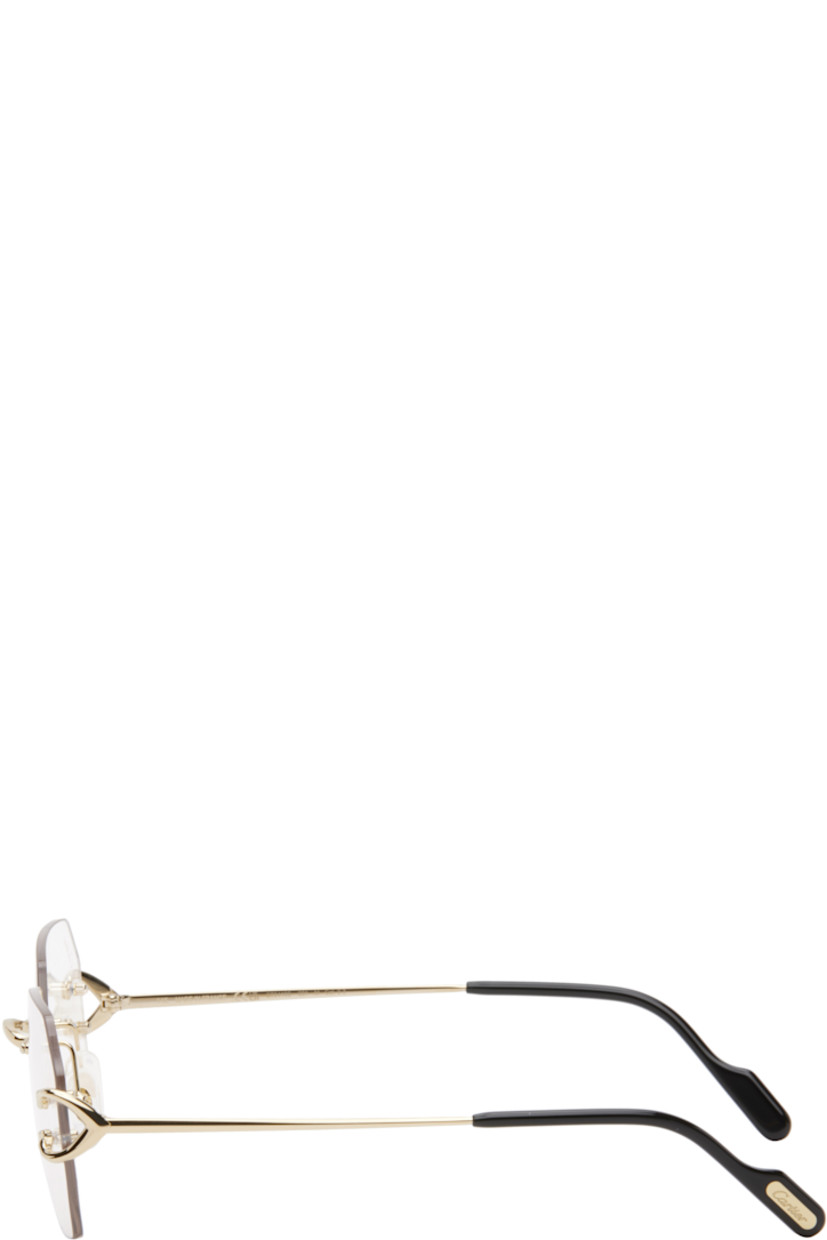 Hexagonal rimless metal-frame optical glasses in gold tone. 

· Adjustable rubber nose pads
· Logo hardware at hinges and tips
· Acetate temple tips in black
· Includes case
· Size: 55.18 140

Part of the Signature C de Cartier collection.

Supplier color: Gold