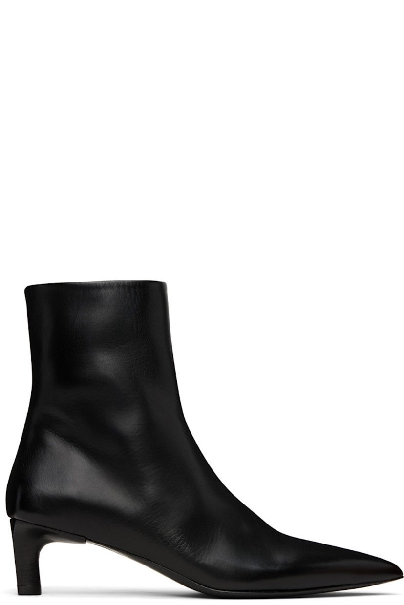 Ankle-high buffed leather boots in black.

· Pointed toe
· Zip closure at inner side
· Stacked leather heel with rubber injection
· Leather sole
· Heel: H2"

Supplier color: Black