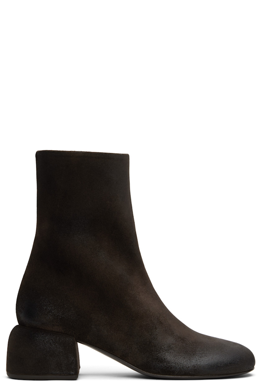 Ankle-high calfskin suede boots. Subtle distressing throughout. 

· Zip closure at inner side
· Grained leather lining
· Suede-covered block heel
· Rubber sole
· Heel: H2.25"

Supplier color: Dark brown