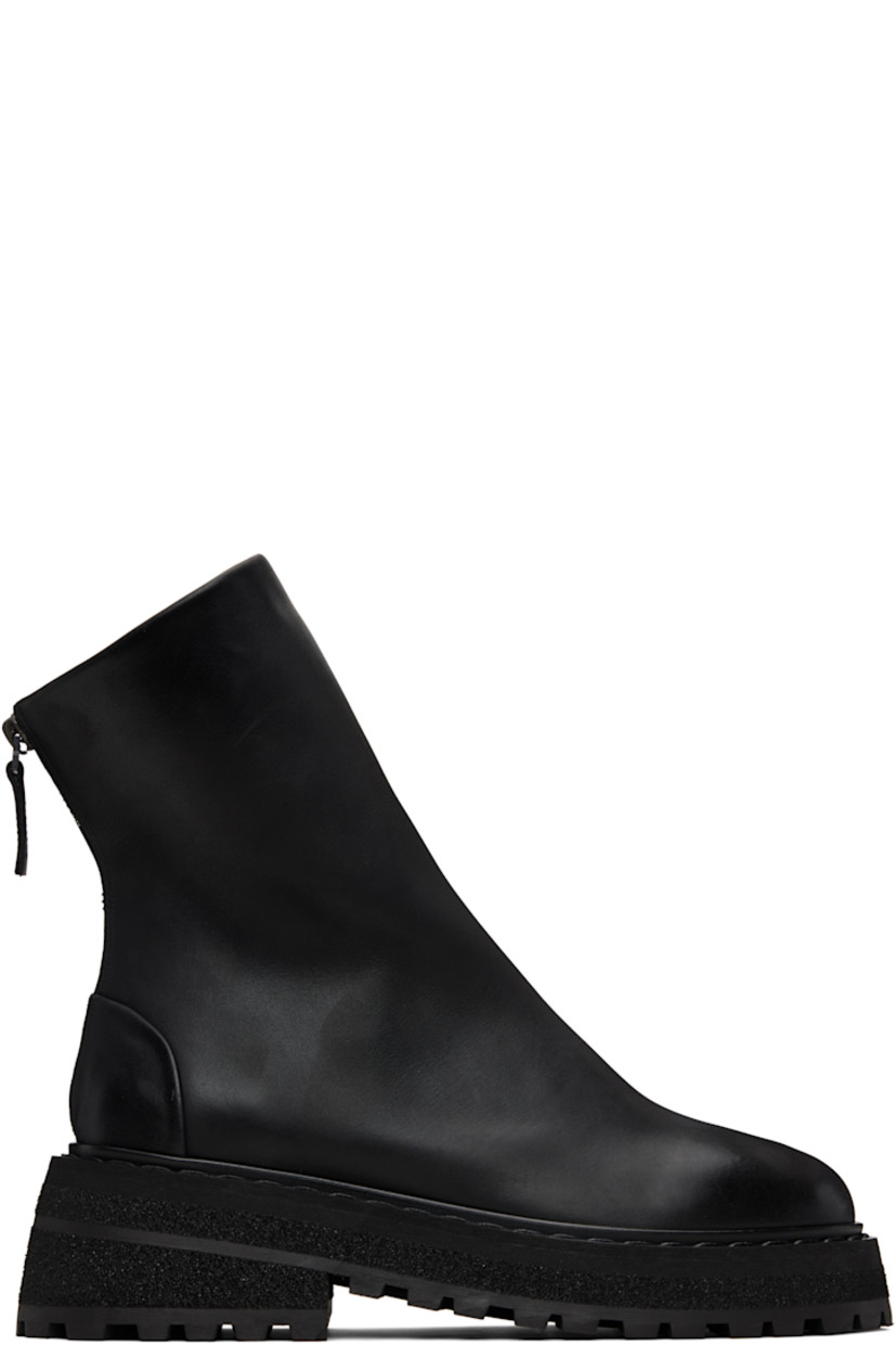 Ankle-high nubuck boots. 

· Zip closure at back
· Buffed leather lining
· Topstitching at welt
· Stacked foam rubber platform midsole
· Treaded rubber sole
· Heel: H2.25"

Supplier color: Black