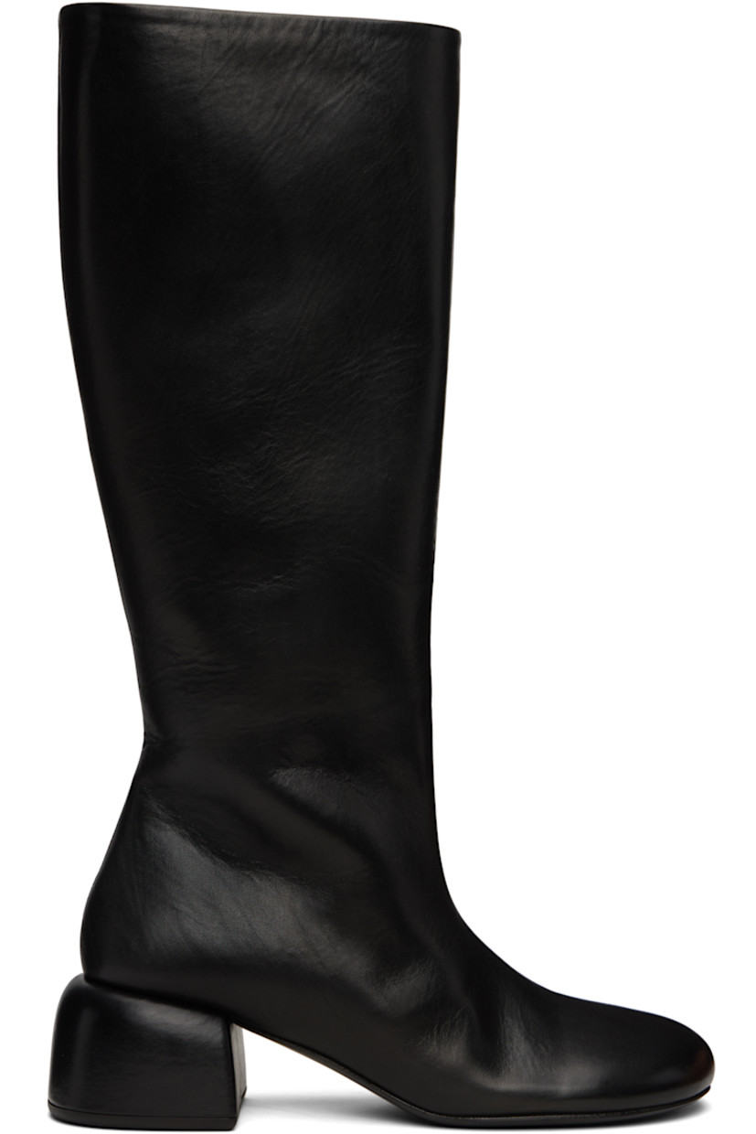 Knee-high buffed leather boots in black.

· Zip closure at inner side
· Covered block heel with rubber injection
· Leather sole with rubber injection
· Heel: H2"

Supplier color: Black