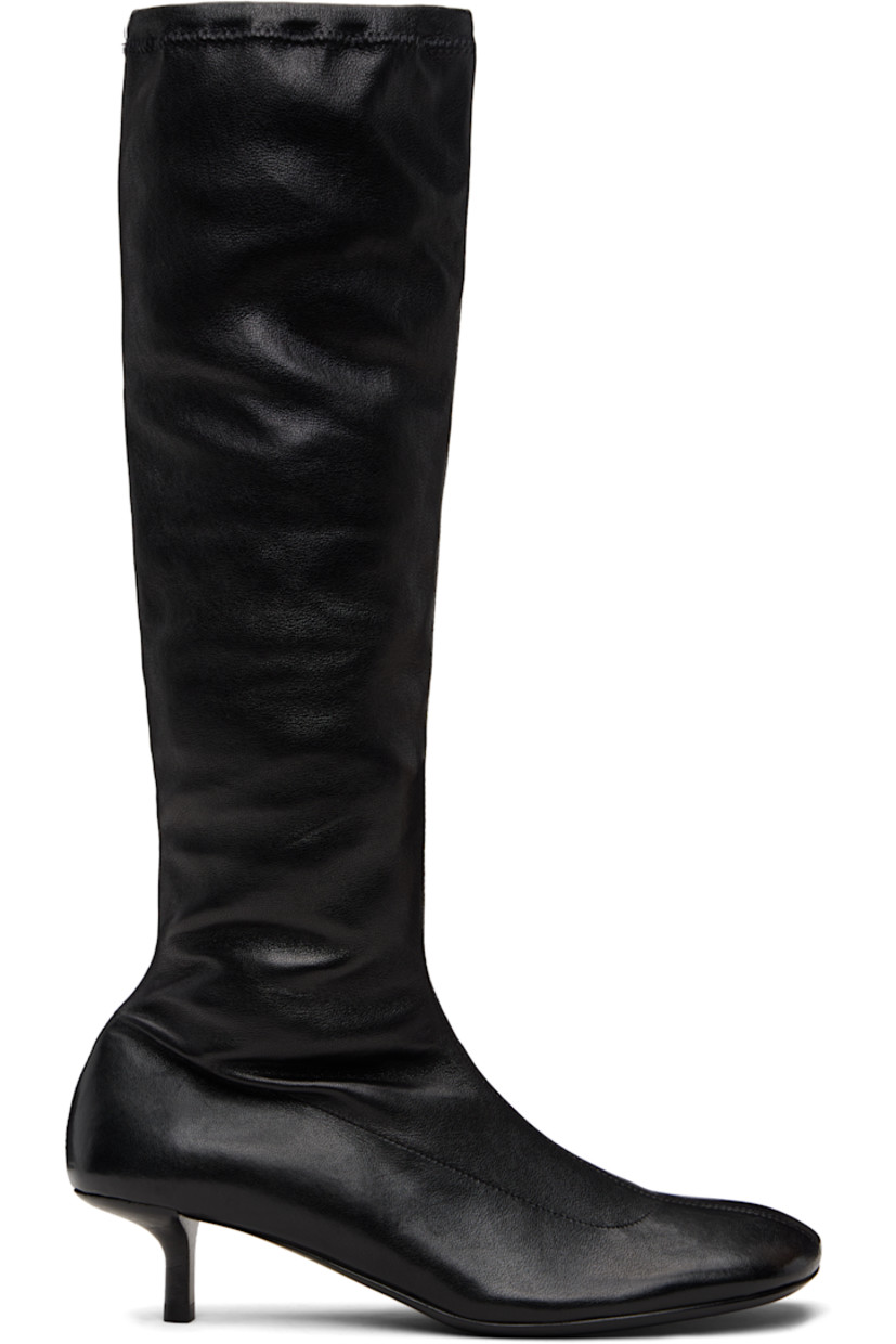 Knee-high grained leather boots. 

· Square toe
· Elasticized collar
· Zip closure at inner side
· Twill lining
· Leather kitten heel with rubber injection
· Leather sole
· Heel: H1.25"

Supplier color: Black