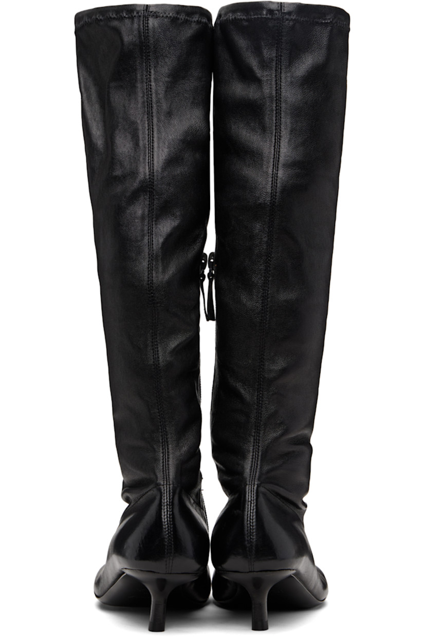 Knee-high grained leather boots. 

· Square toe
· Elasticized collar
· Zip closure at inner side
· Twill lining
· Leather kitten heel with rubber injection
· Leather sole
· Heel: H1.25"

Supplier color: Black