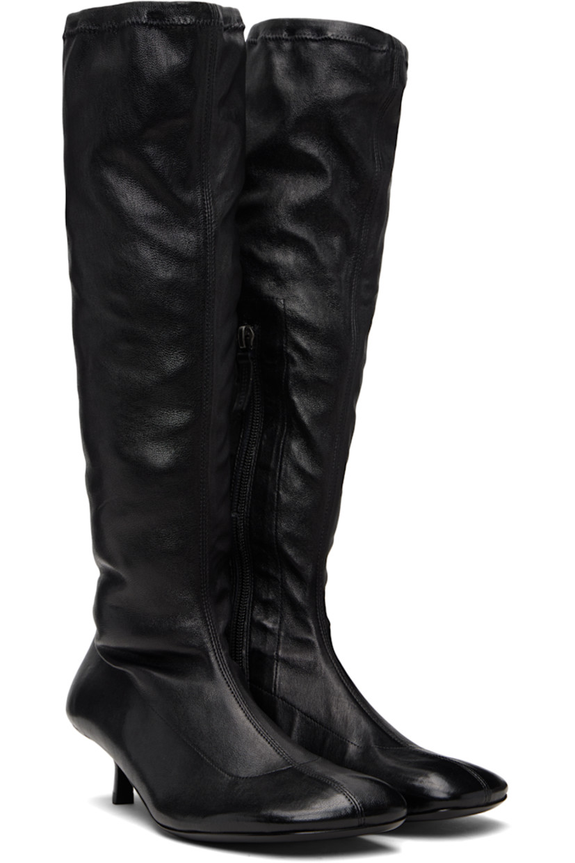 Knee-high grained leather boots. 

· Square toe
· Elasticized collar
· Zip closure at inner side
· Twill lining
· Leather kitten heel with rubber injection
· Leather sole
· Heel: H1.25"

Supplier color: Black