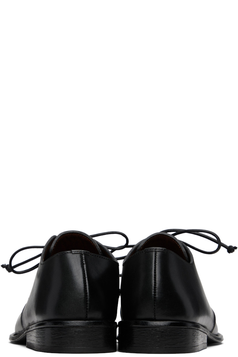 Buffed leather derbys.

· Lace-up closure
· Stacked leather heel with rubber injection
· Leather sole with rubber injection

Supplier color: Black