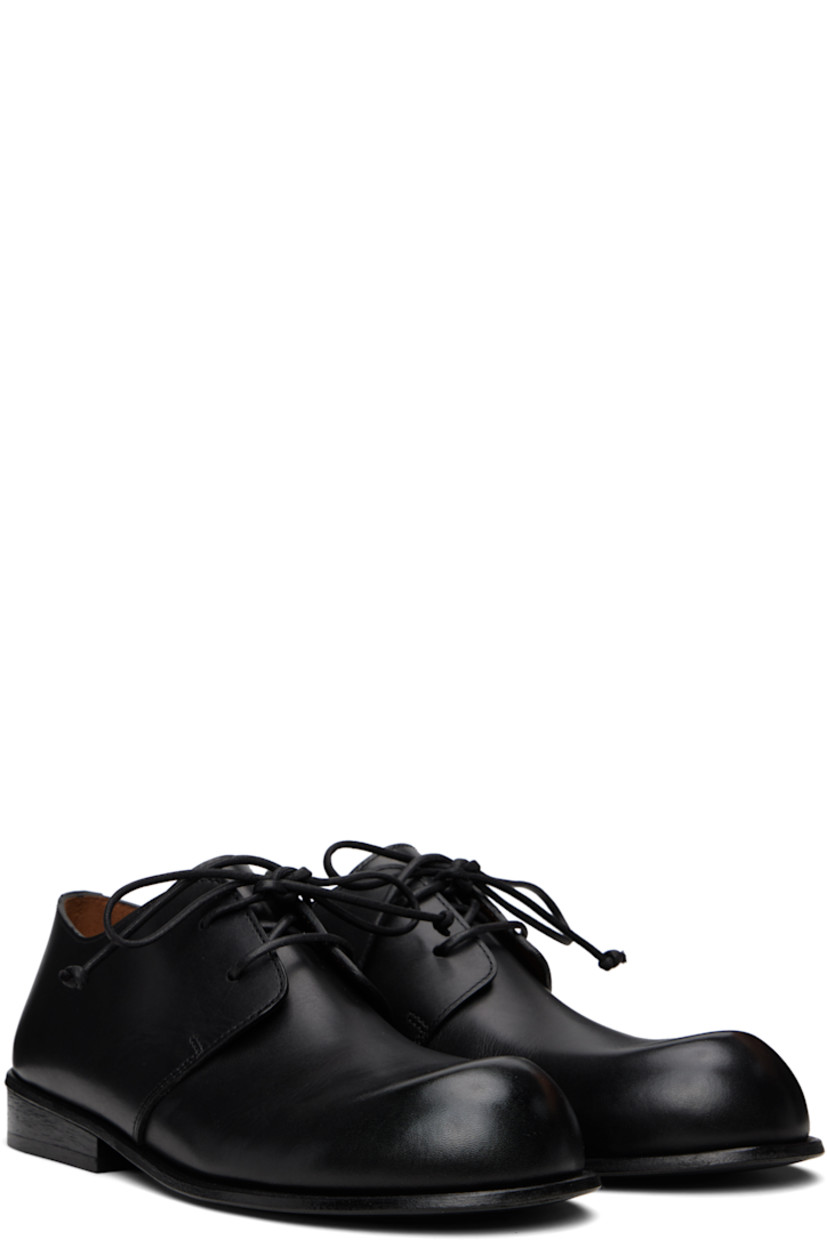 Buffed leather derbys.

· Lace-up closure
· Stacked leather heel with rubber injection
· Leather sole with rubber injection

Supplier color: Black