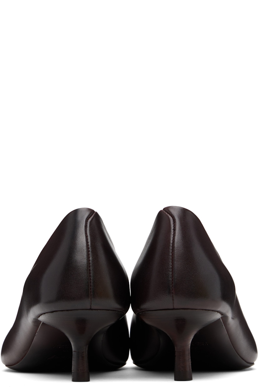Buffed leather heels.

· Square toe
· Stacked leather stiletto heel with rubber injection
· Leather sole
· Heel: H1.75"

Supplier color: Chocowine