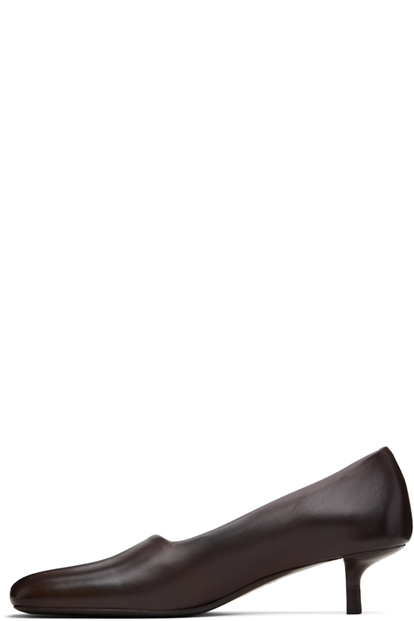 Buffed leather heels.

· Square toe
· Stacked leather stiletto heel with rubber injection
· Leather sole
· Heel: H1.75"

Supplier color: Chocowine