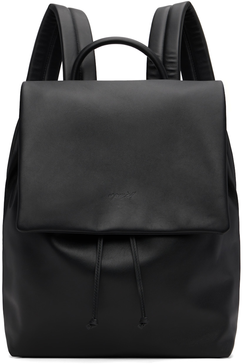 Buffed leather backpack.

· Rolled carry handle
· Padded adjustable shoulder straps
· Logo-embossed magnetic flap 
· Drawstring at throat
· Zip pocket at interior 
· H14.5"  W12.5" x D6"

Supplier color: Black