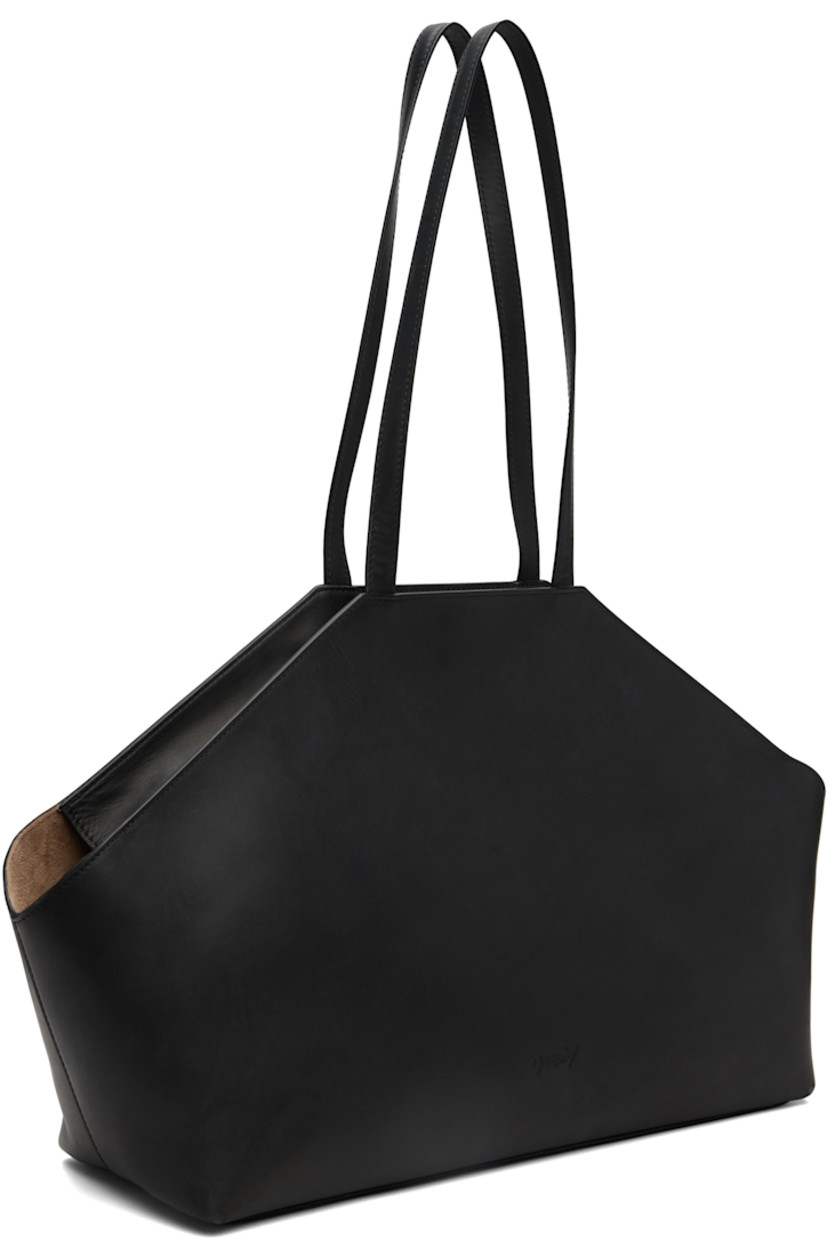 Buffed leather messenger bag.

· Fixed shoulder straps
· Logo embossed at face
· Zip closure
· Suede lining
· H11" x W20" x D5.5"

Supplier color: Black