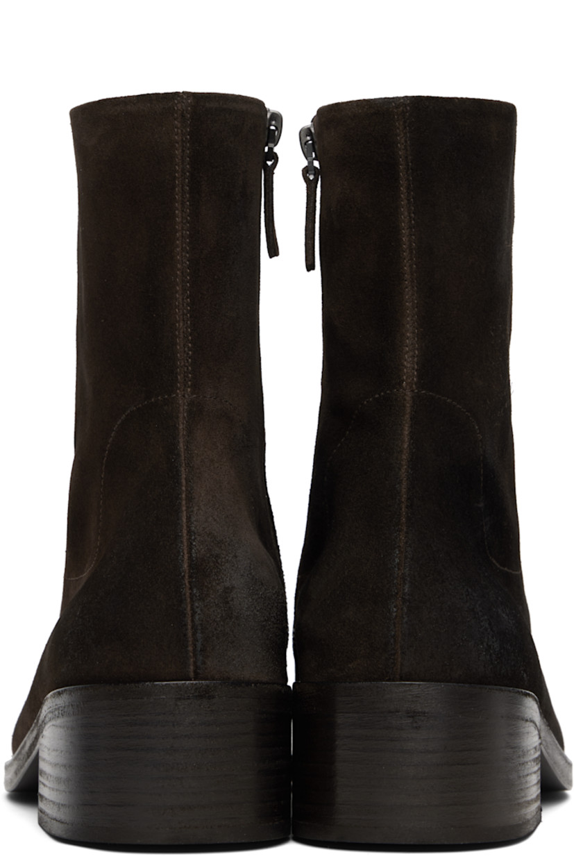 Ankle-high calfskin suede boots. Subtle distressing throughout. 

· Square toe
· Zip closure at inner side
· Suede and grained leather lining
· Stacked leather block heel
· Leather sole with rubber heel
· Heel: H2.25"

Supplier color: Dark brown