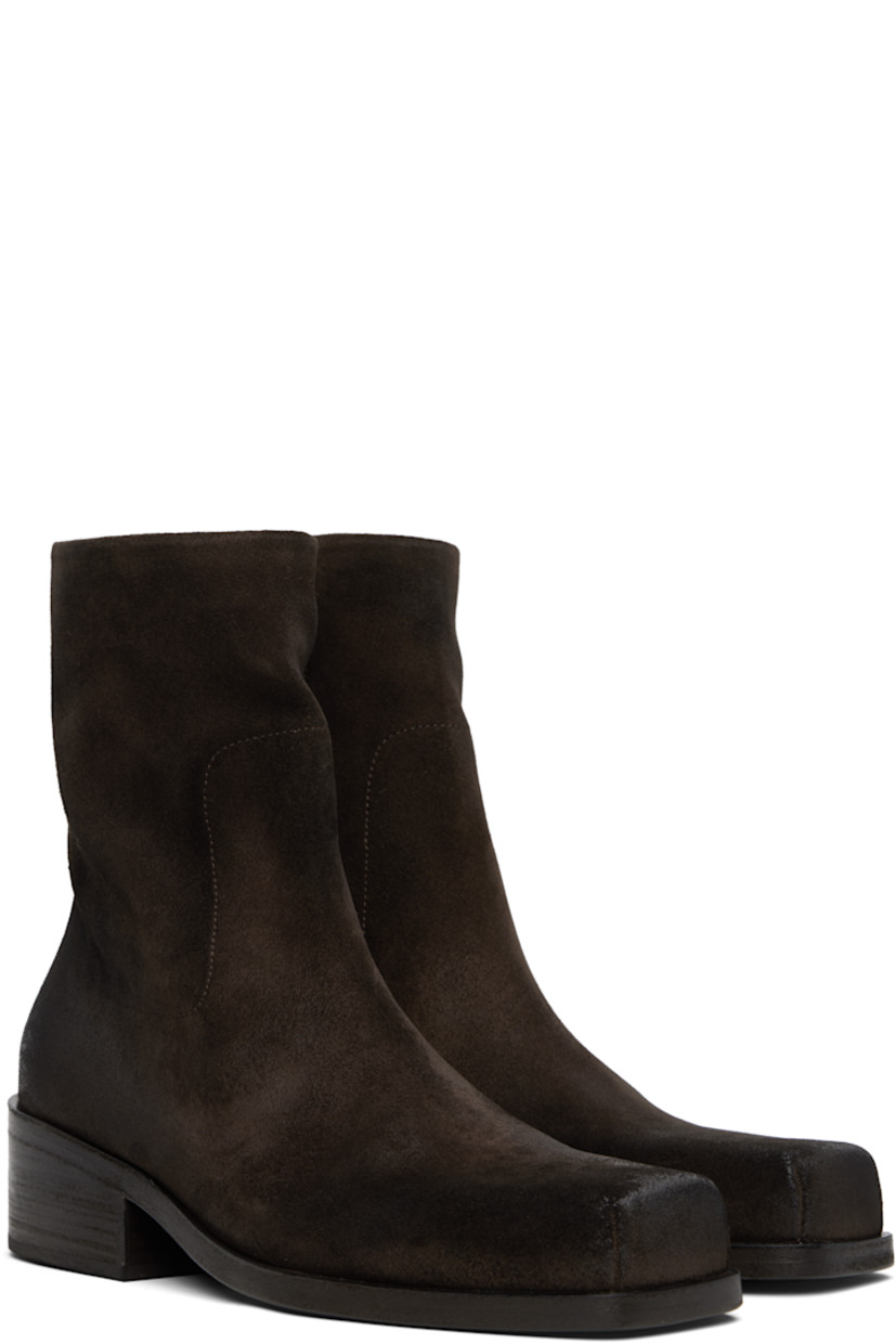 Ankle-high calfskin suede boots. Subtle distressing throughout. 

· Square toe
· Zip closure at inner side
· Suede and grained leather lining
· Stacked leather block heel
· Leather sole with rubber heel
· Heel: H2.25"

Supplier color: Dark brown