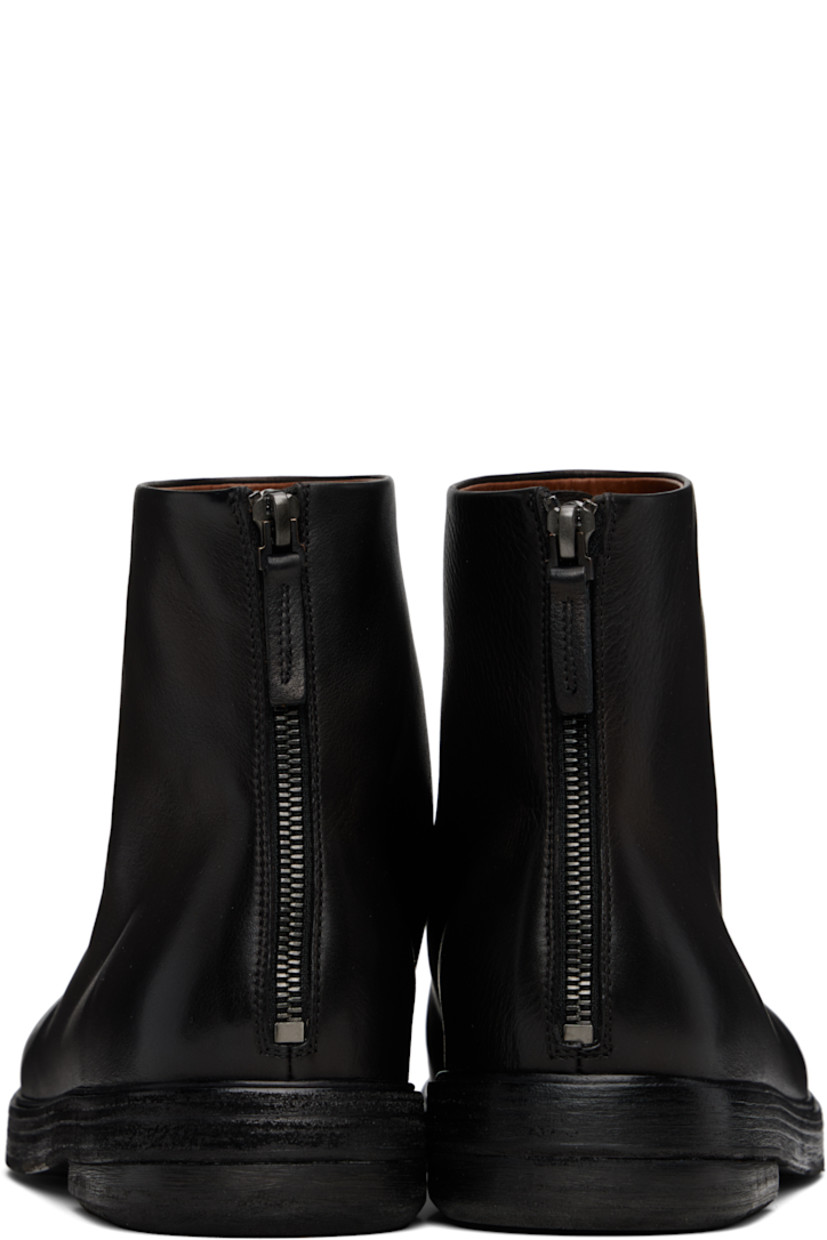 Ankle-high buffed leather boots.

· Zip closure at heel
· Stacked leather midsole and heel
· Leather sole

Supplier color: Black