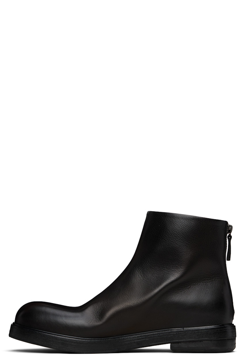 Ankle-high buffed leather boots.

· Zip closure at heel
· Stacked leather midsole and heel
· Leather sole

Supplier color: Black