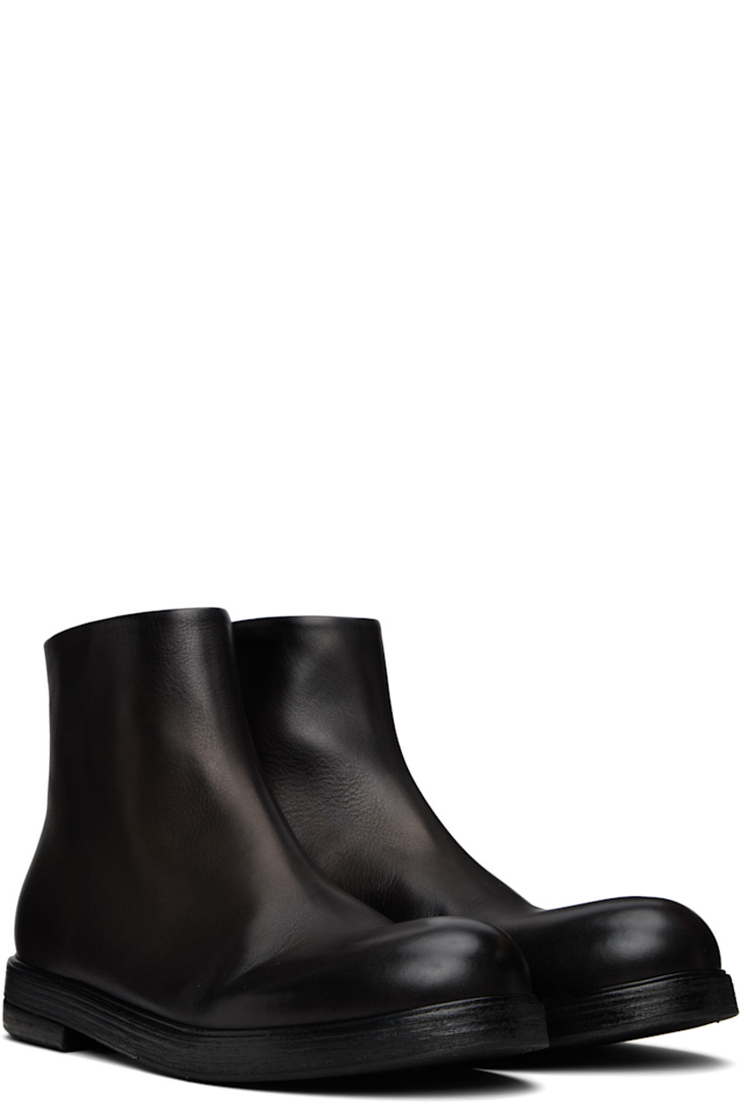 Ankle-high buffed leather boots.

· Zip closure at heel
· Stacked leather midsole and heel
· Leather sole

Supplier color: Black