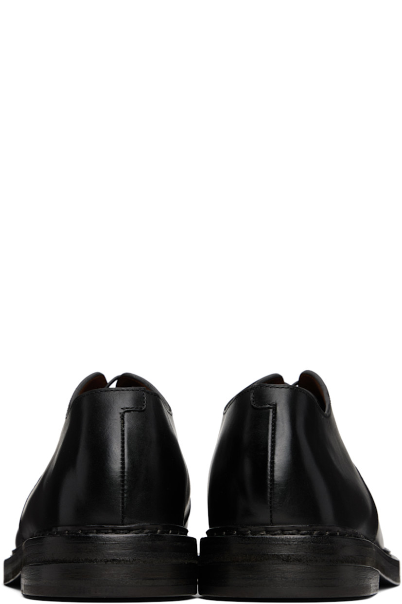Buffed leather derbys in black.

· Lace-up closure
· Topstitching at welt
· Stacked leather heel with rubber injection 
· Leather sole

Supplier color: Black