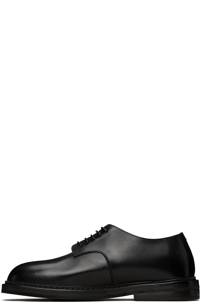 Buffed leather derbys in black.

· Lace-up closure
· Topstitching at welt
· Stacked leather heel with rubber injection 
· Leather sole

Supplier color: Black