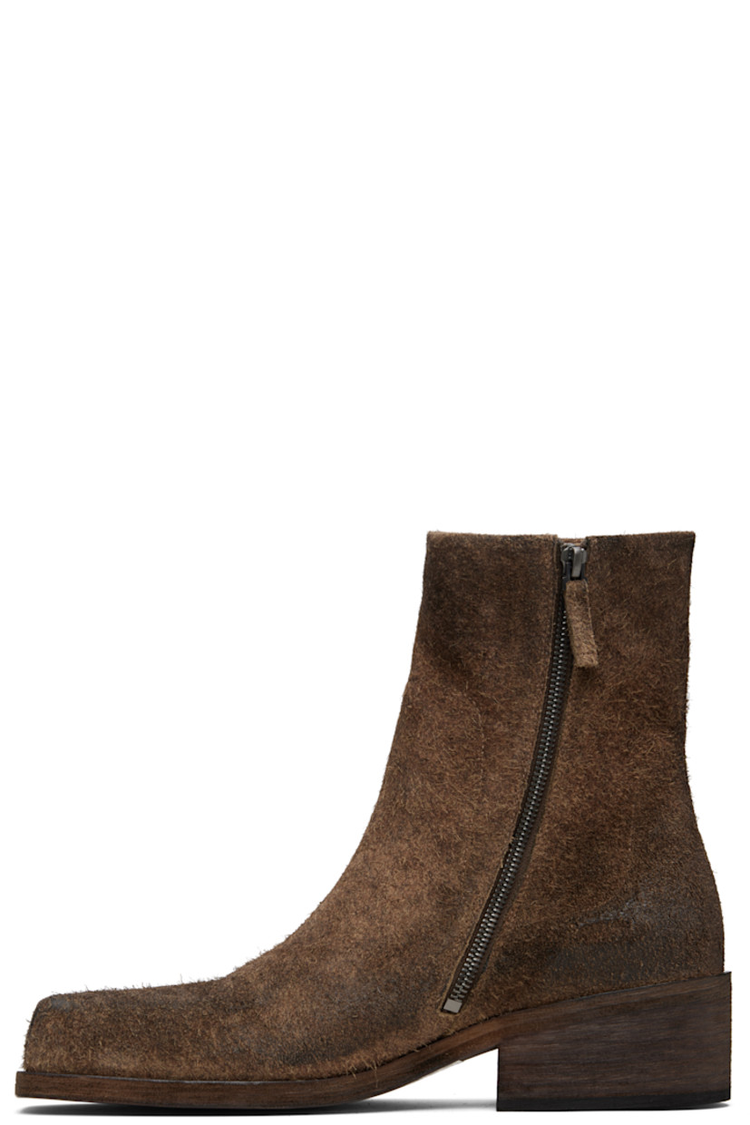Ankle-high distressed suede boots.

· Square toe
· Zip closure at inner side
· Stacked leather heel with rubber injection
· Leather sole
· Heel: H2"

Supplier color: Brown