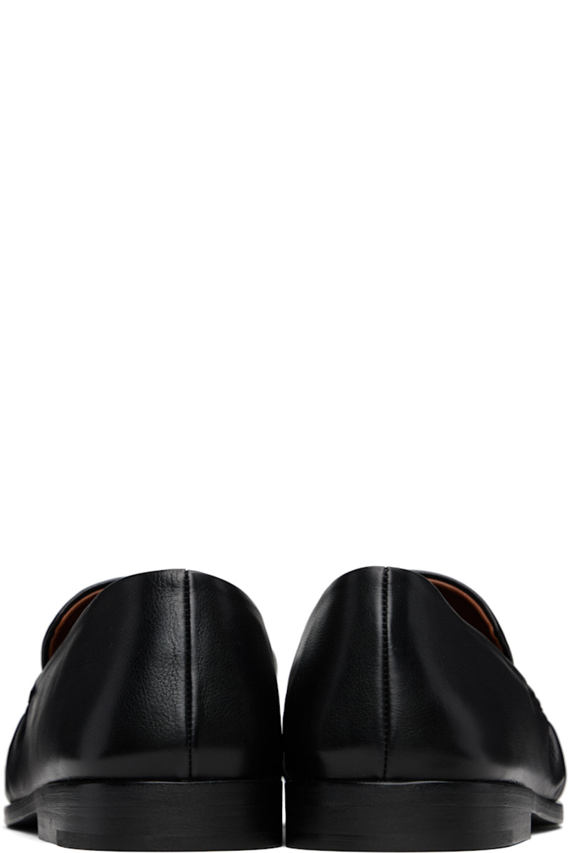 Buffed leather loafers.

· Gathering at moc toe
· Stacked leather heel with rubber injection
· Leather sole

Supplier color: Black
