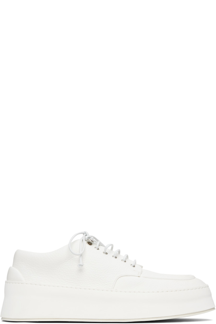 Grained leather derbys.

· Moc toe
· Lace-up closure
· Padded tongue and collar
· Buffed leather lining
· Foam rubber platform midsole
· Treaded rubber sole
· Platform: H1.5"

Supplier color: Optical white