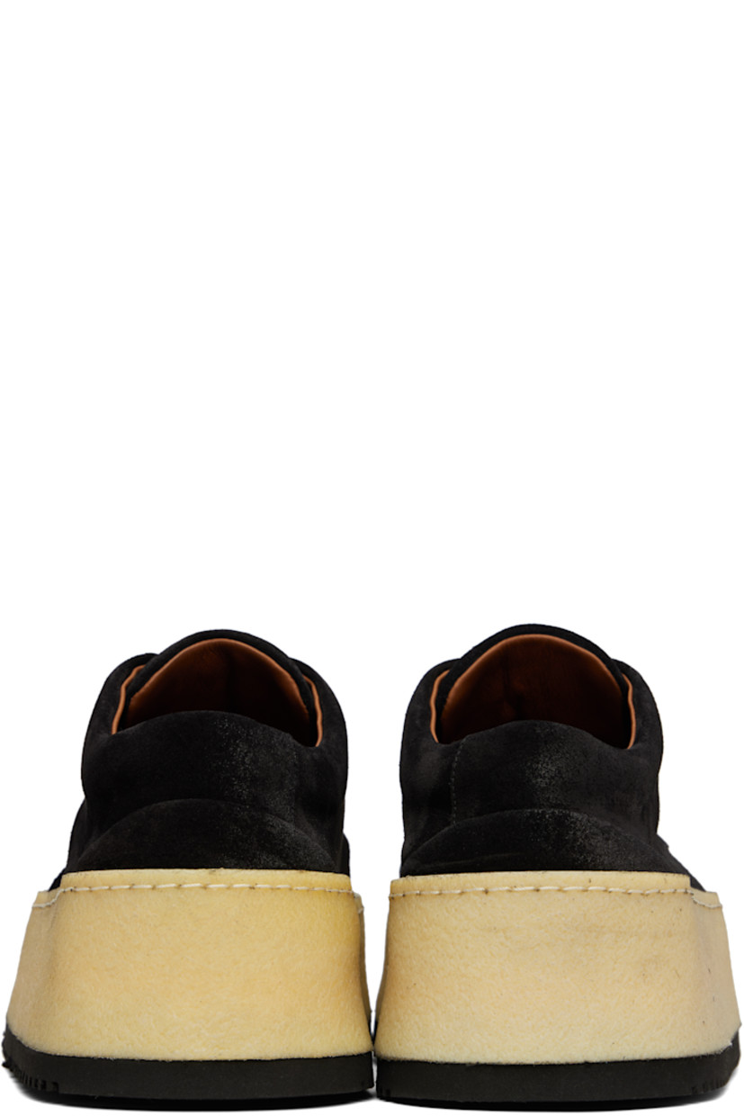 Suede derbys in black.

· Moc toe
· Lace-up closure
· Buffed leather lining
· Crêpe rubber platform midsole
· Treaded foam rubber sole
· Platform: H1.5"

Supplier color: Black
