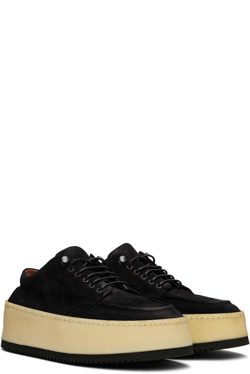 Suede derbys in black.

· Moc toe
· Lace-up closure
· Buffed leather lining
· Crêpe rubber platform midsole
· Treaded foam rubber sole
· Platform: H1.5"

Supplier color: Black