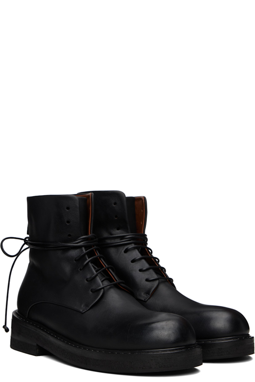 Ankle-high buffed leather boots.

· Lace-up closure
· Zip closure at heel
· Topstitching at welt
· Stacked leather and foam rubber midsole
· Treaded rubber sole
· Heel: H1.75"

Supplier color: Black
