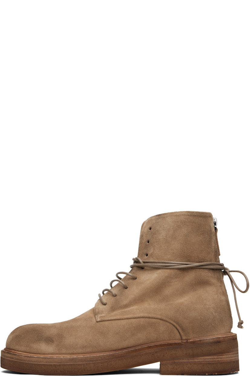 Ankle-high suede boots.

· Lace-up closure
· Zip closure at heel
· Buffed leather lining
· Topstitching at welt
· Stacked leather and foam rubber midsole
· Treaded rubber sole
· Heel: H1.75"

Supplier color: Hazelnut