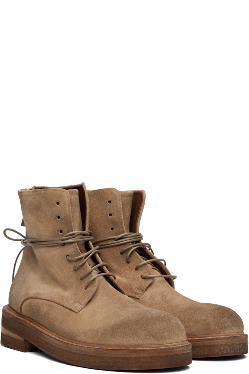 Ankle-high suede boots.

· Lace-up closure
· Zip closure at heel
· Buffed leather lining
· Topstitching at welt
· Stacked leather and foam rubber midsole
· Treaded rubber sole
· Heel: H1.75"

Supplier color: Hazelnut