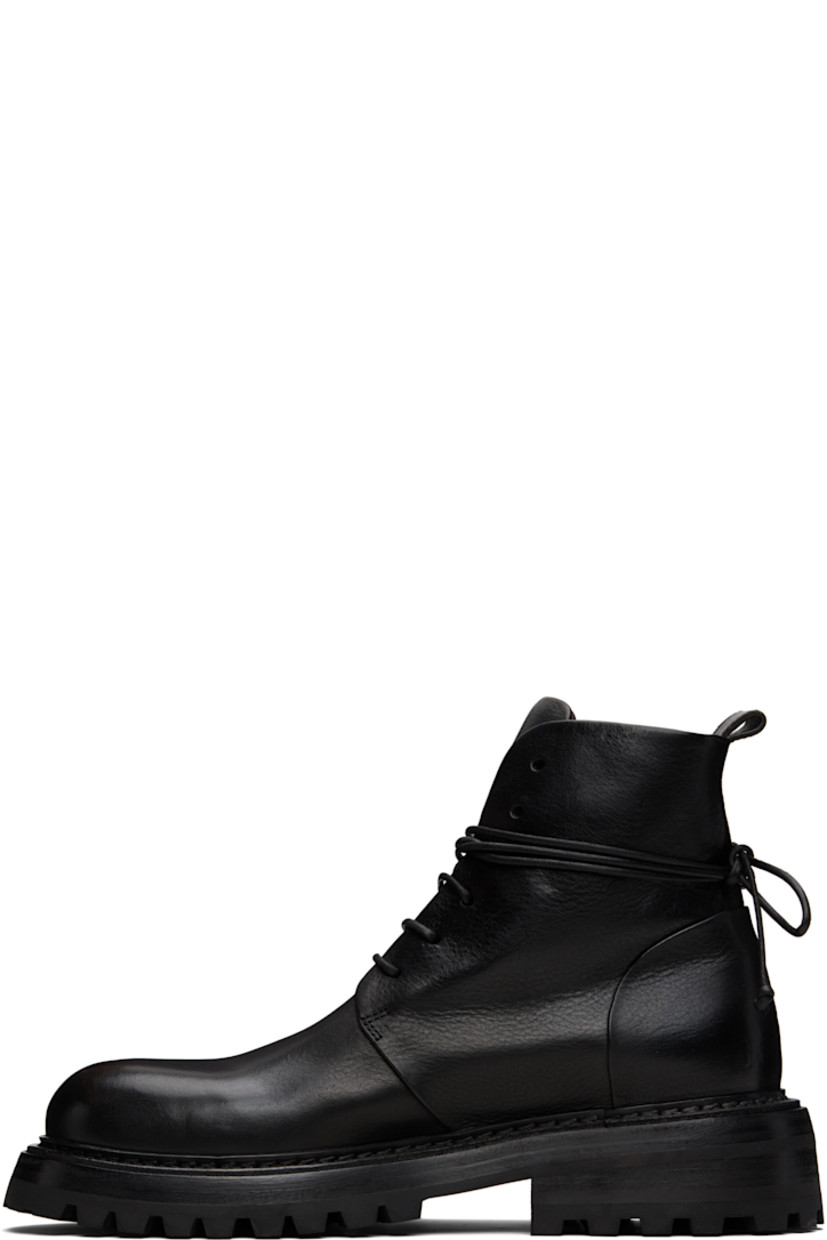 Ankle-high grained leather boots.

· Lace-up closure
· Pull-loop at heel collar
· Buffed leather lining
· Topstitching at welt
· Stacked leather and rubber heel and midsole
· Treaded rubber sole

Supplier color: Black