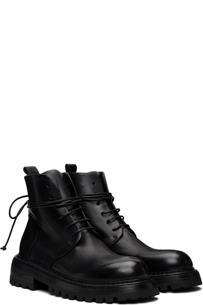 Ankle-high grained leather boots.

· Lace-up closure
· Pull-loop at heel collar
· Buffed leather lining
· Topstitching at welt
· Stacked leather and rubber heel and midsole
· Treaded rubber sole

Supplier color: Black