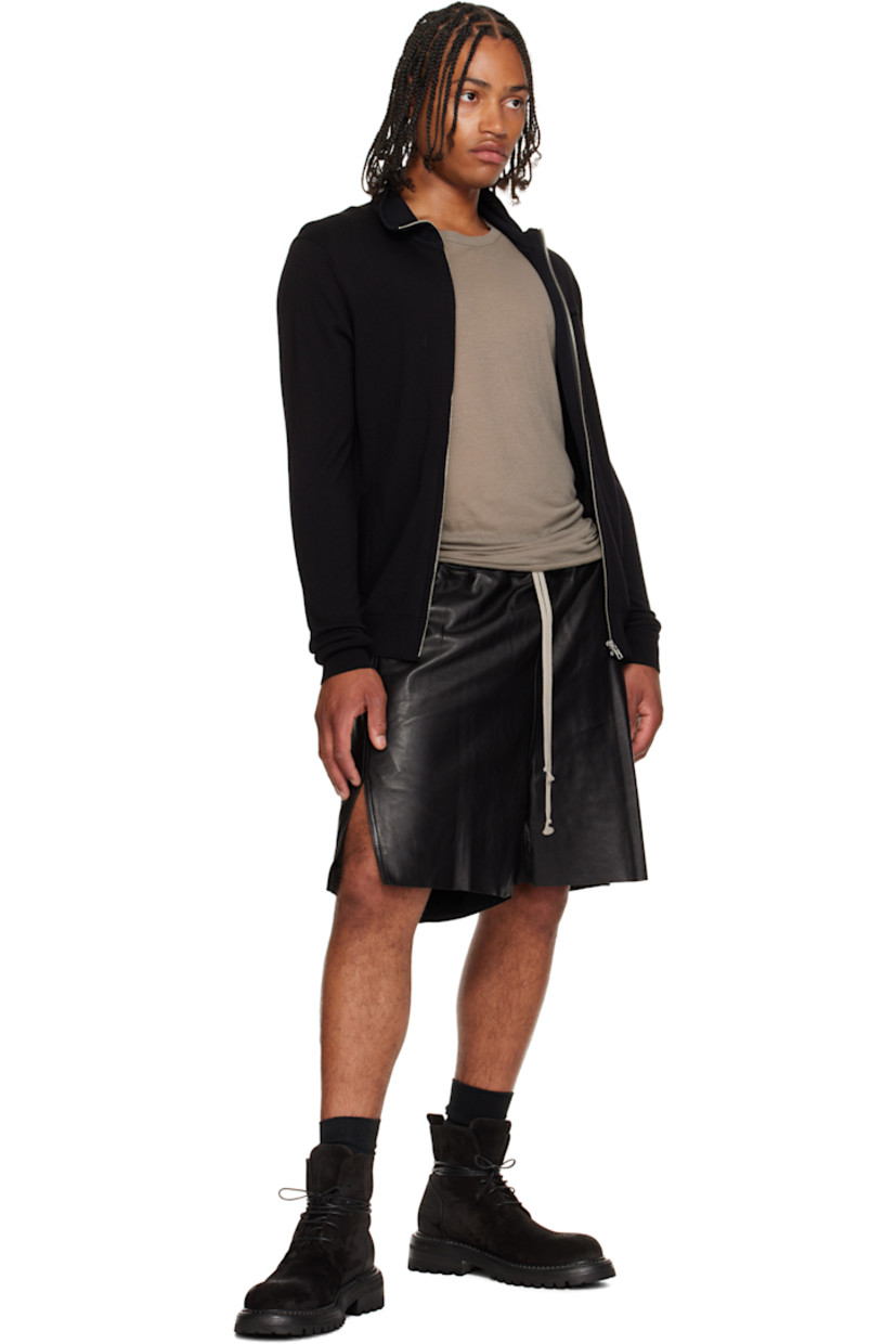 Ankle-high suede boots.

· Lace-up closure
· Pull-loop at heel collar
· Buffed leather lining
· Topstitching at welt
· Stacked leather and rubber heel and midsole
· Treaded rubber sole

Supplier color: Black