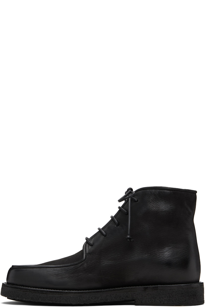 Ankle-high nubuck boots.

· Moc toe
· Lace-up closure
· Topstitching at welt
· Crêpe rubber midsole
· Treaded rubber sole

Supplier color: Black