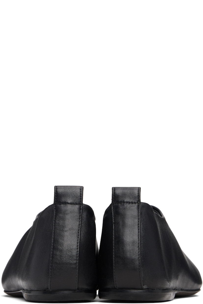 Buffed lambskin loafers.

· Square toe
· Central seam at vamp
· Pull-loop at heel collar
· Leather sole with rubber injections

Supplier color: Black