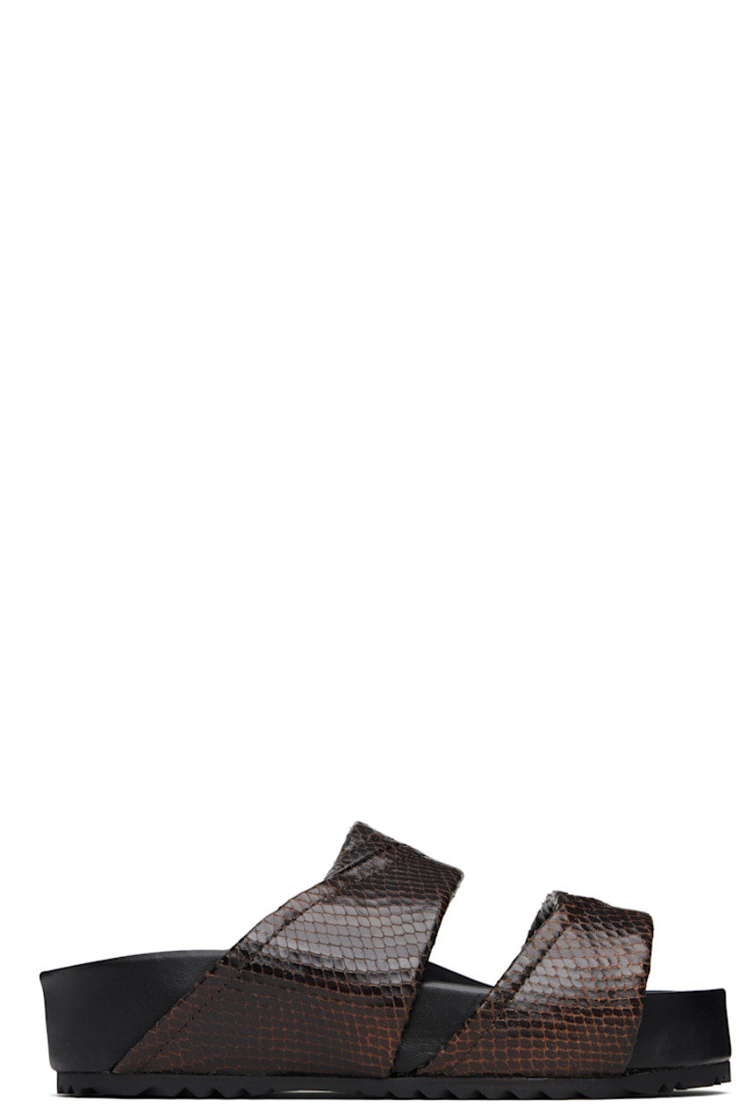 Snake-embossed leather slip-on flat sandals.

· Open toe
· Logo patch at molded footbed
· Treaded rubber sole

Supplier color: Dark brown