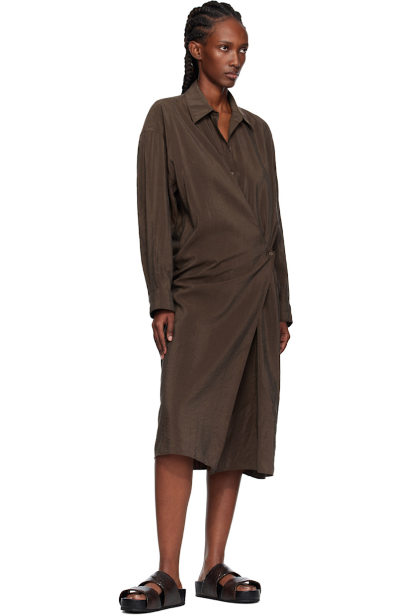 Snake-embossed leather slip-on flat sandals.

· Open toe
· Logo patch at molded footbed
· Treaded rubber sole

Supplier color: Dark brown