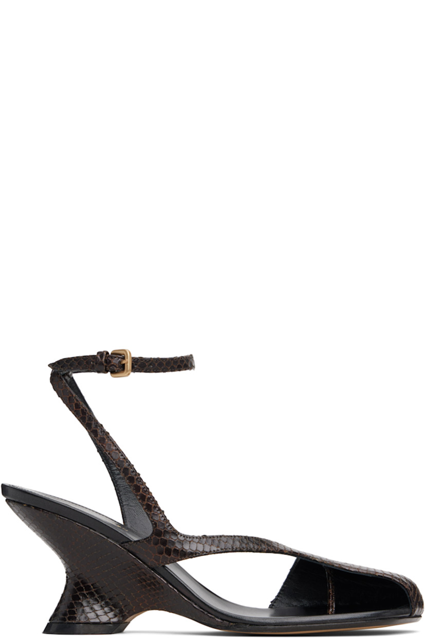 Snake-embossed leather heeled sandals.

· Cutout at square toe
· Pin-buckle ankle strap
· Logo stamp at padded footbed
· Covered wedge heel with rubber injection
· Leather sole
· Heel: H2.75"

Supplier color: Dark brown
