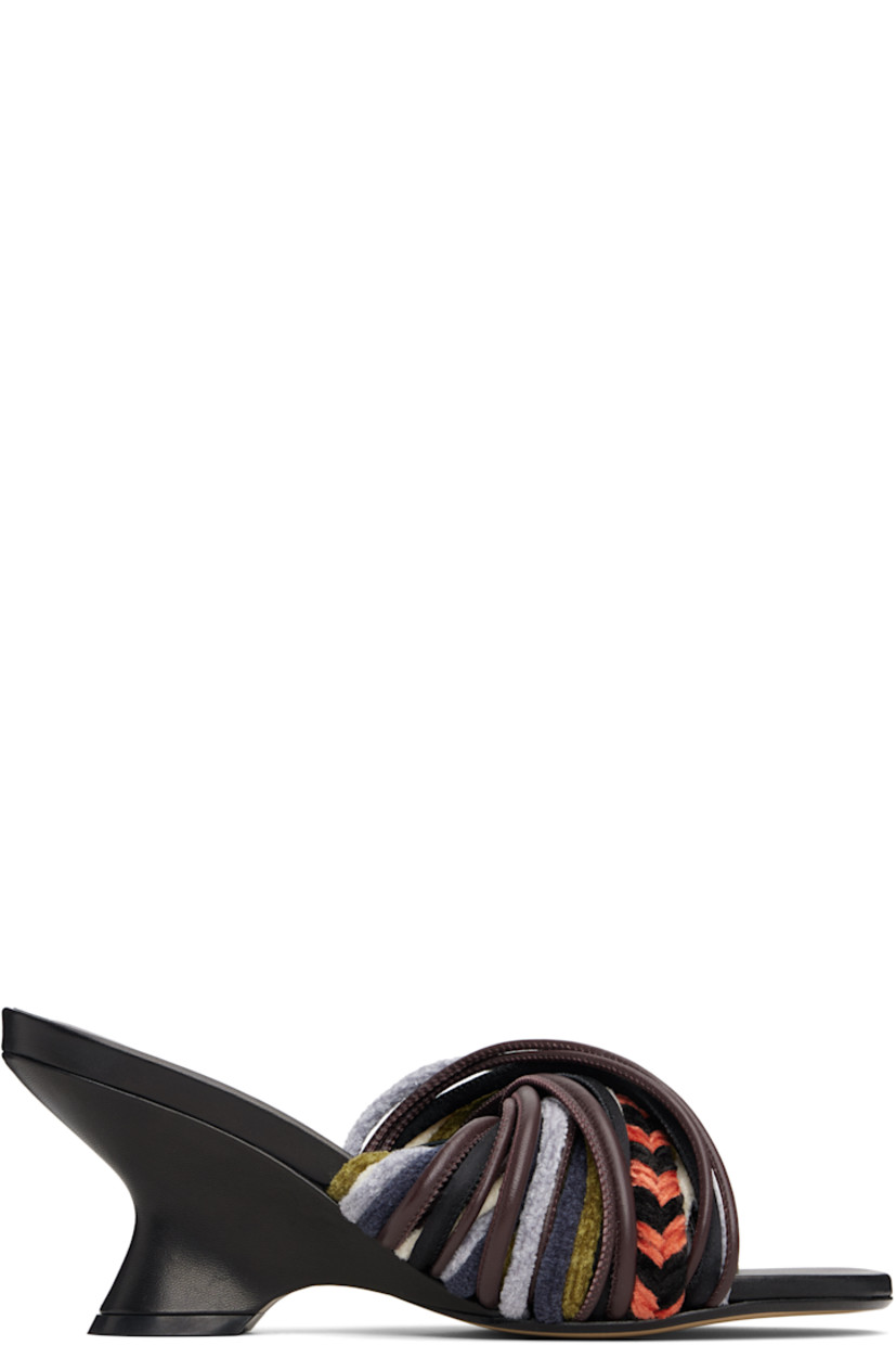 Velvet and buffed leather slip-on heeled sandals.

· Open toe
· Twisted straps at vamp
· Logo stamp at padded footbed
· Covered wedge heel with rubber injection
· Leather sole
· Heel: H3"

Supplier color: Multi