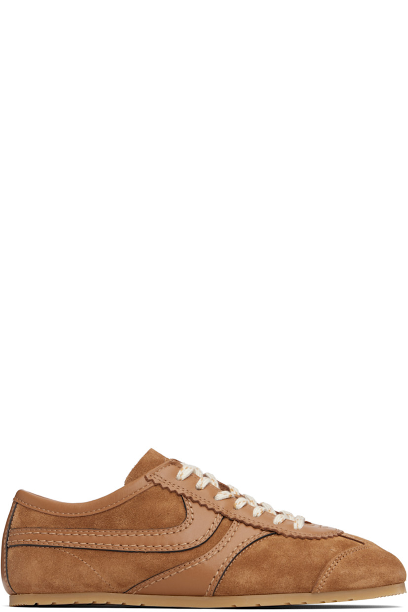 Low-top calfskin suede and buffed calfskin sneakers.

· Serrated edge at vamp
· Lace-up closure
· Logo printed at tongue
· Treaded rubber sole

Supplier color: Tan