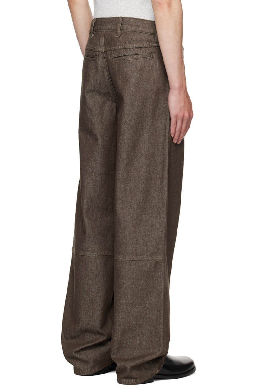 Non-stretch denim jeans.

· Fading throughout
· Belt loops
· Four-pocket styling
· Zip fly
· Pockets with zip gusset at front
· Paneled legs
· Logo-engraved antiqued copper-tone hardware

Supplier color: Brown