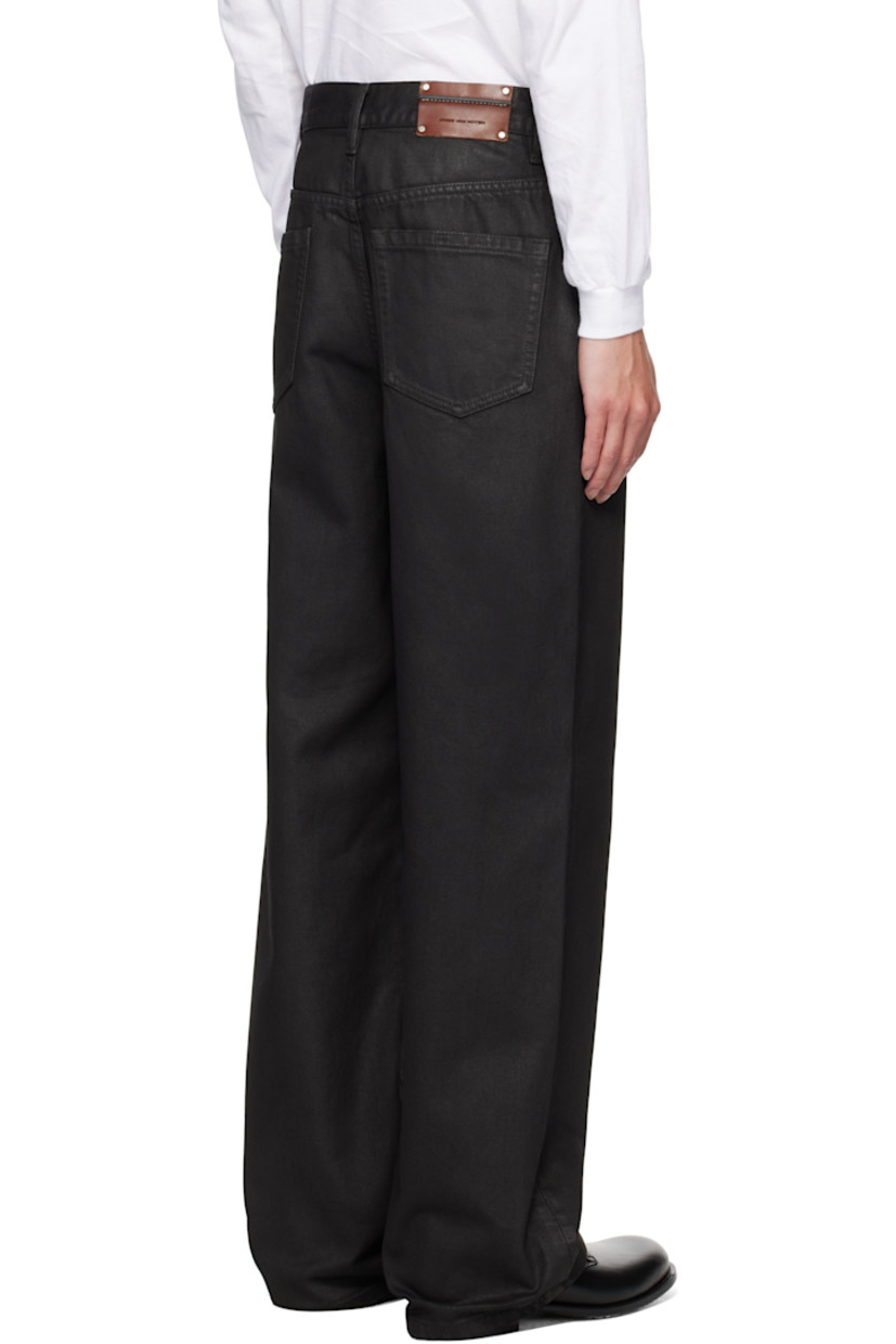 Coated heavyweight non-stretch denim jeans.

· Loose-fit, straight-leg
· Mid-rise
· Belt loops
· Five-pocket styling
· Button fly
· Pinched leather logo patch at back waistband
· Logo-engraved silver-tone hardware

Supplier color: Black