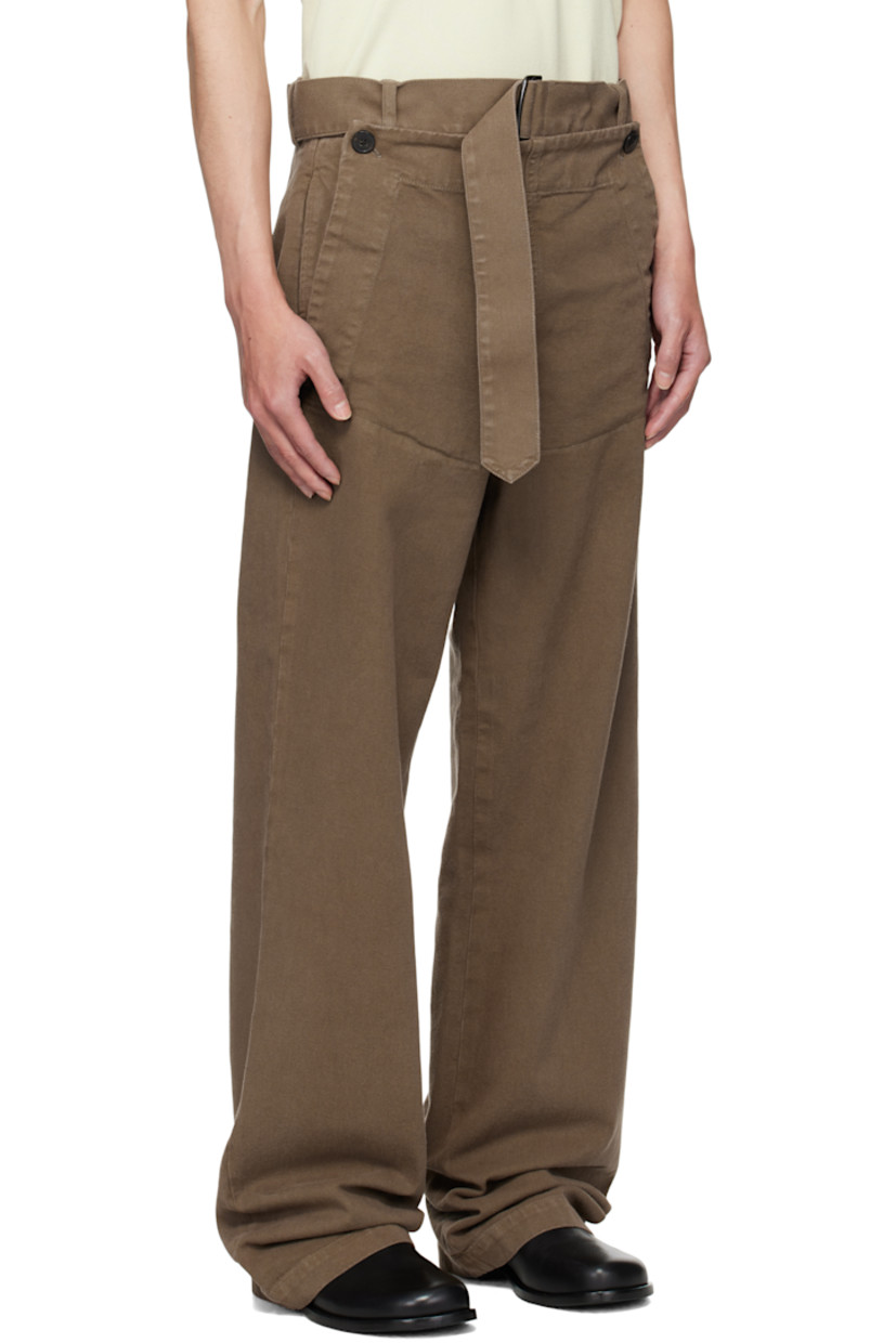 Overdyed cotton twill trousers.

· Straight-leg
· Mid-rise
· Belt loops
· Detachable cinch belt at waistband
· Four-pocket styling
· Zip fly
· Buttoned overlay at front

Supplier color: Mud