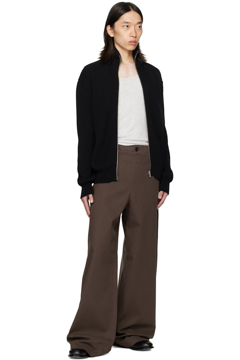 Plain-woven stretch cotton trousers.

· Belt loops
· Four-pocket styling
· Zip fly
· Buttoned overlay at front
· Concealed patch pockets

Supplier color: Mud