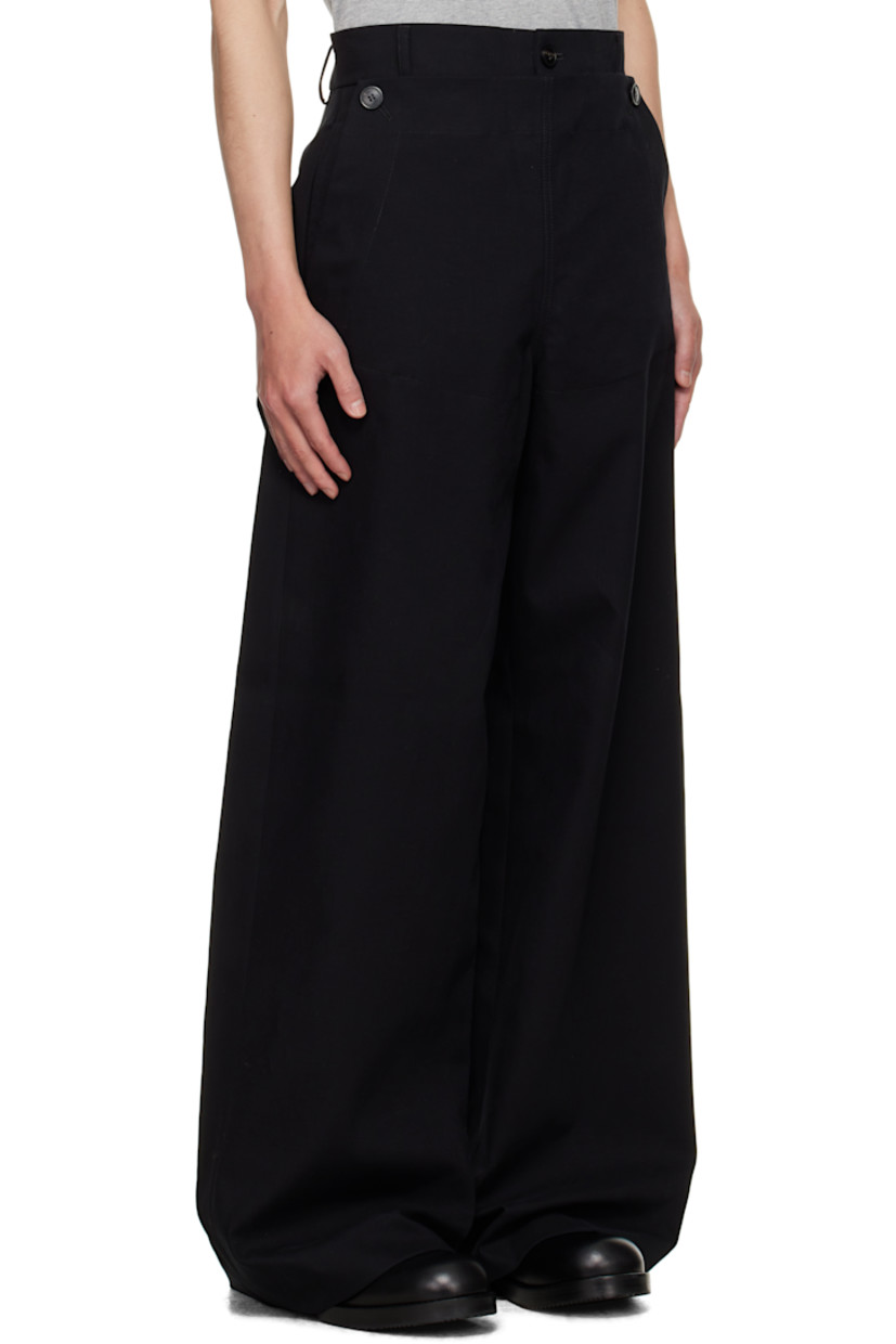 Stretch cotton canvas trousers.

· Belt loops
· Four-pocket styling
· Zip fly
· Buttoned overlay at front

Supplier color: Black