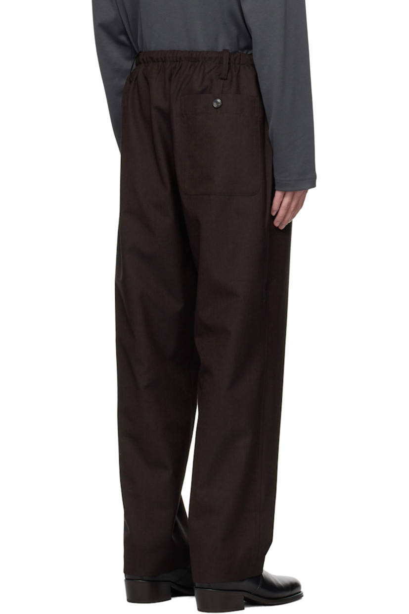 Wool canvas trousers.

· Drawstring and belt loops at elasticized waistband
· Three-pocket styling
· Zip fly

Supplier color: Dark brown