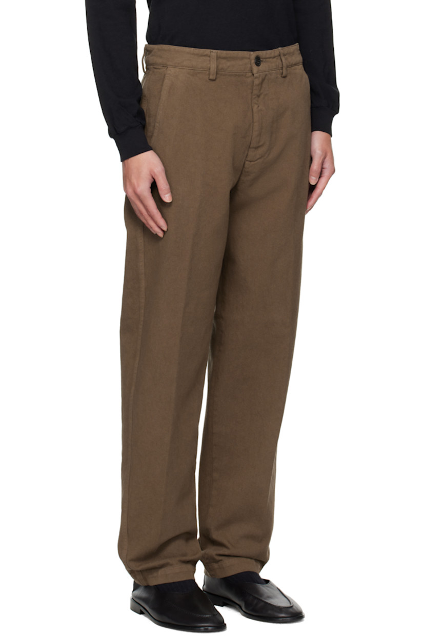 Overdyed cotton twill trousers.

· Belt loops
· Four-pocket styling
· Zip fly

Supplier color: Mud