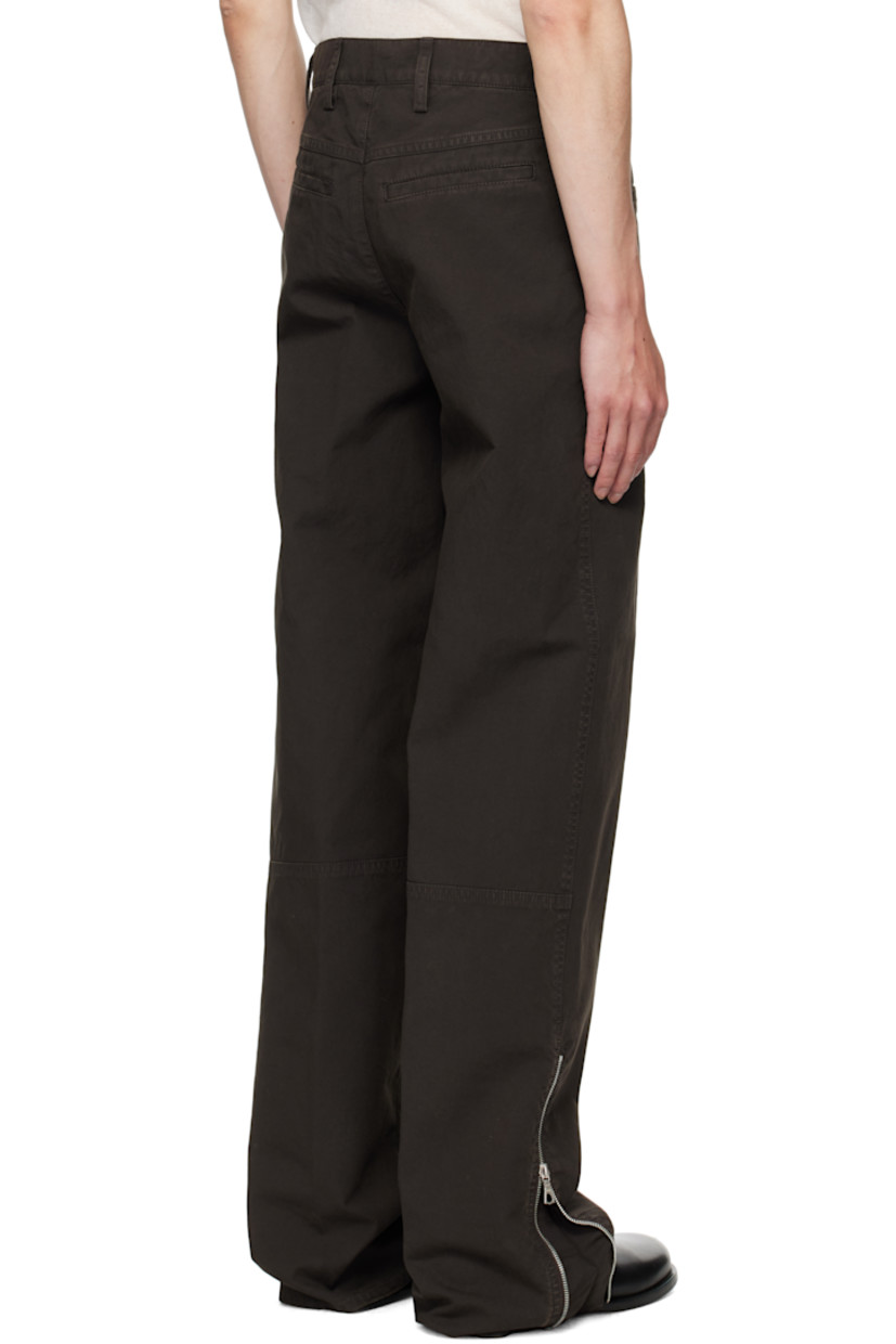 Overdyed cotton twill trousers.

· Belt loops
· Four-pocket styling
· Zip fly
· Pockets with zip gusset at front
· Paneled legs
· Logo-engraved antiqued copper-tone hardware

Supplier color: Brown