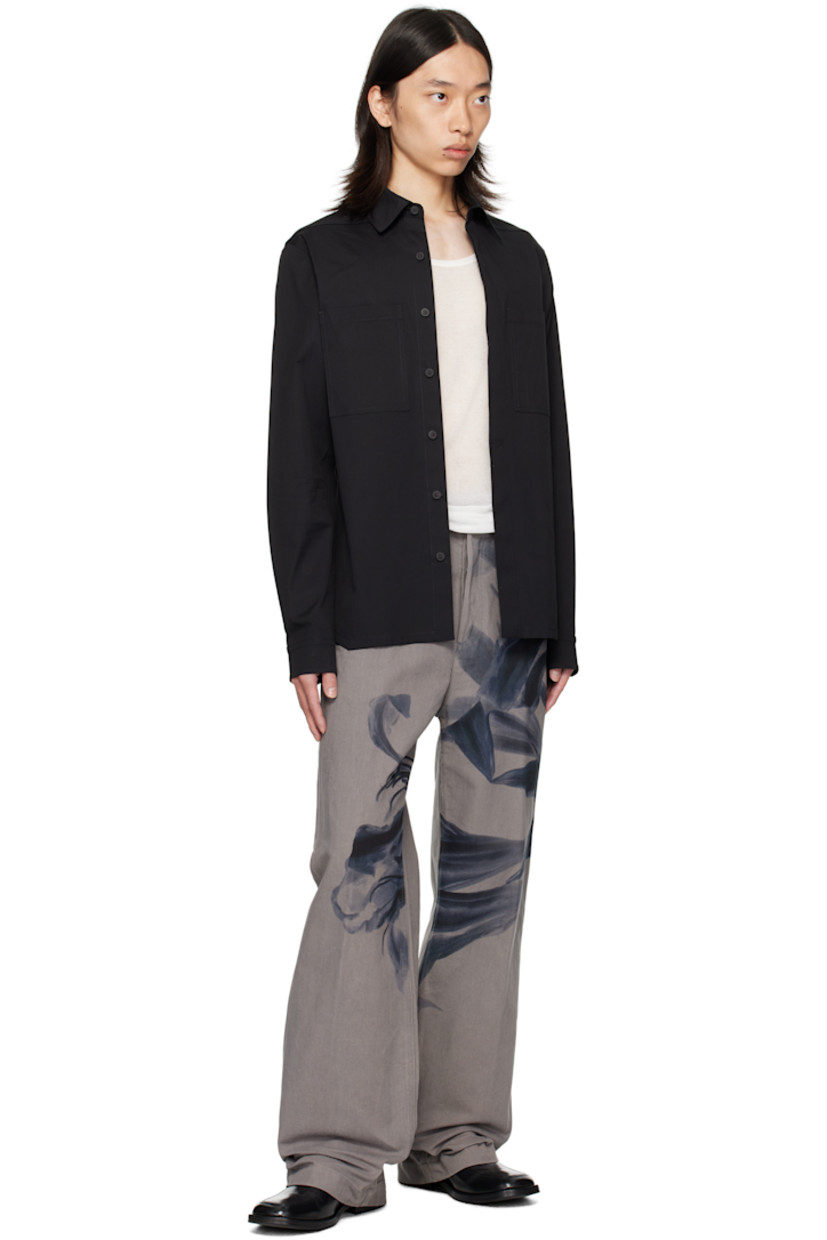 Cotton canvas trousers.

· Graphic printed throughout
· Belt loops
· Five-pocket styling
· Button fly
· Creased legs
· Patch pockets at back

Supplier color: Grey
