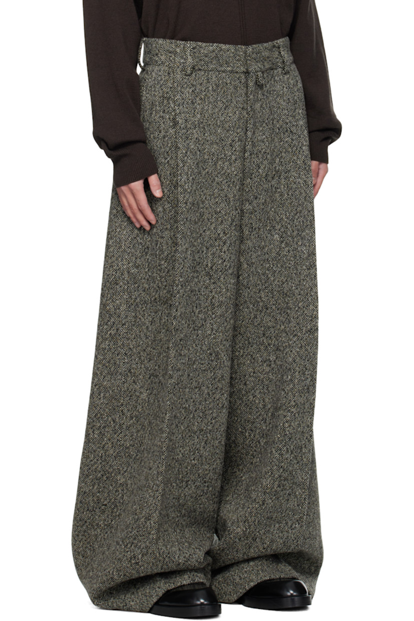 Brushed wool- and viscose-blend tweed trousers.

· Marling throughout
· Wide, straight-leg
· Belt loops
· Four-pocket styling
· Zip fly
· Pleats at front

Supplier color: Grey