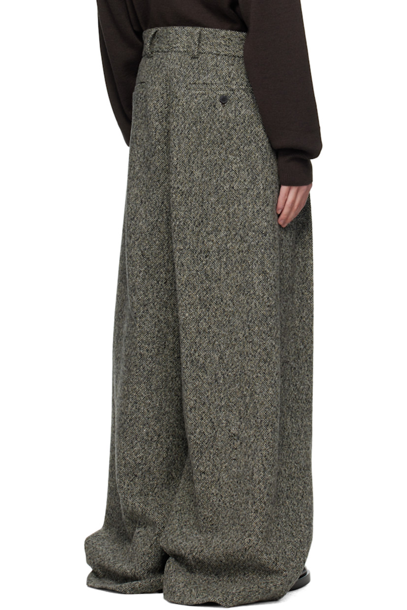 Brushed wool- and viscose-blend tweed trousers.

· Marling throughout
· Wide, straight-leg
· Belt loops
· Four-pocket styling
· Zip fly
· Pleats at front

Supplier color: Grey